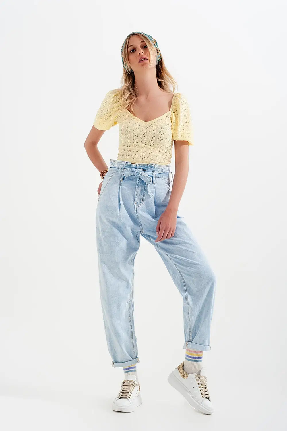 Tapered leg jeans with paper bag waist in light vintage wash