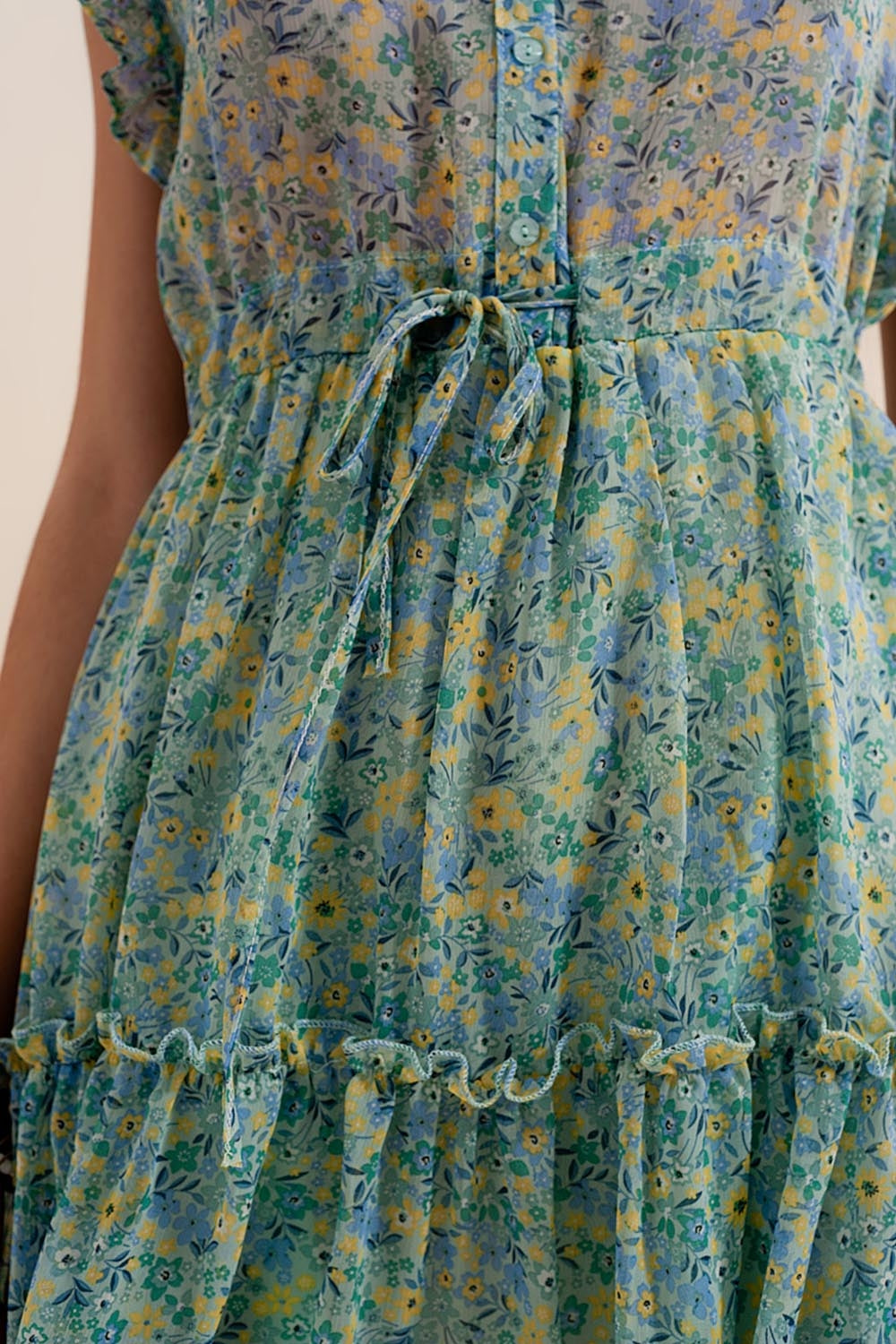 Mini dress with ruffle trims in vintage floral in green