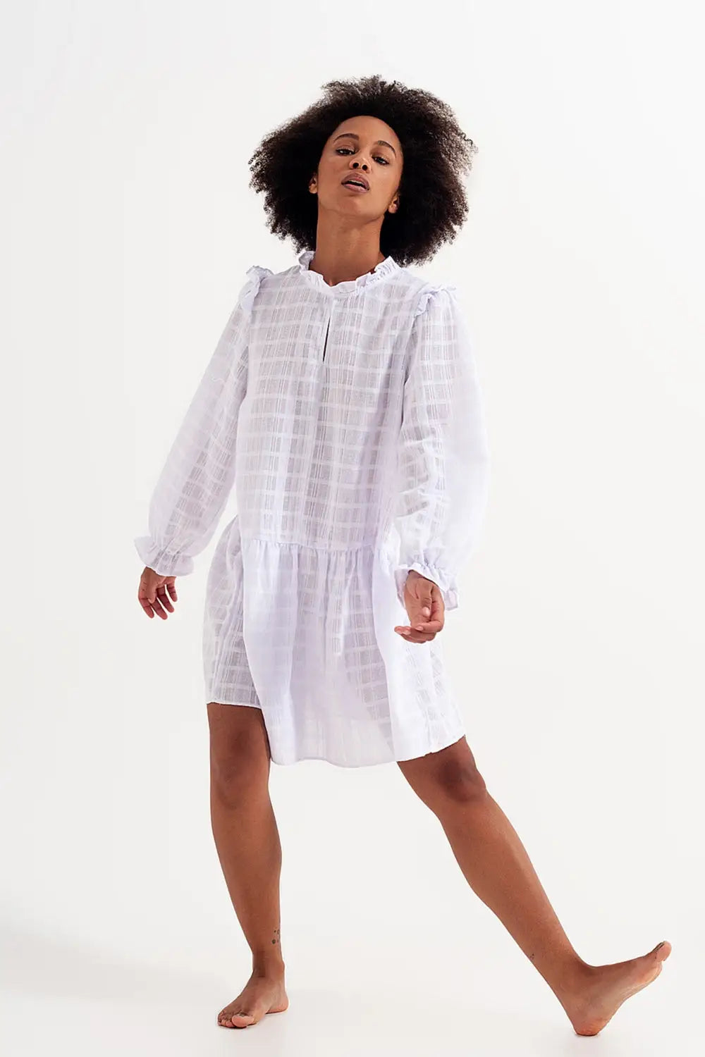 Voluminous mini dress with ruffles in white - Dresses