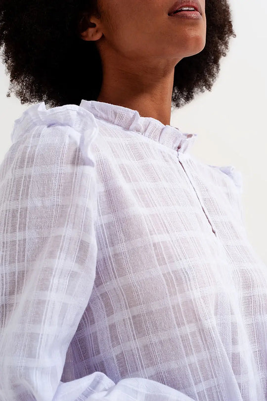 Voluminous mini dress with ruffles in white - Dresses
