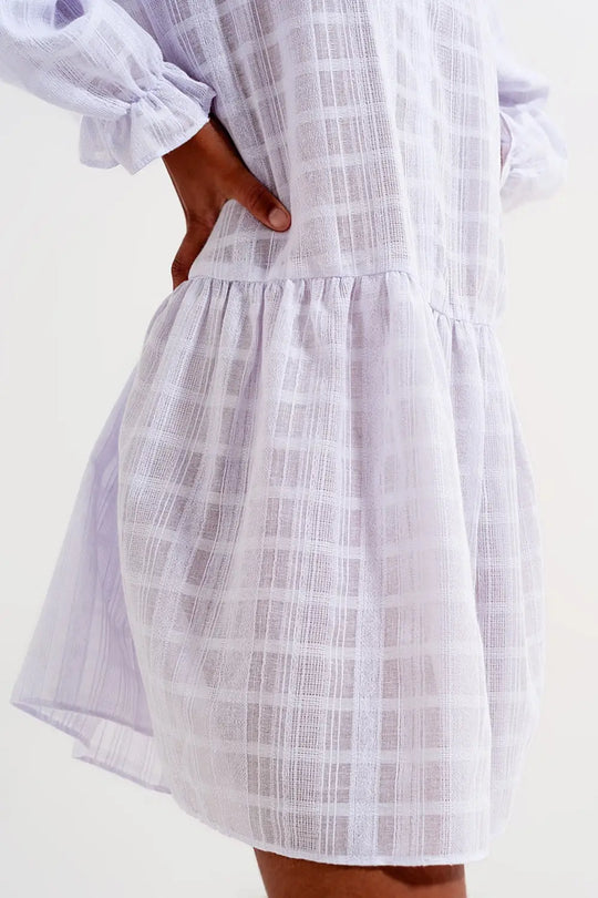 Voluminous mini dress with ruffles in white - Dresses