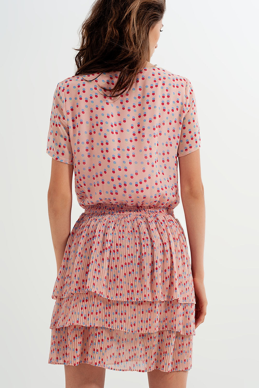 Shirred mini dress with peplum in pink