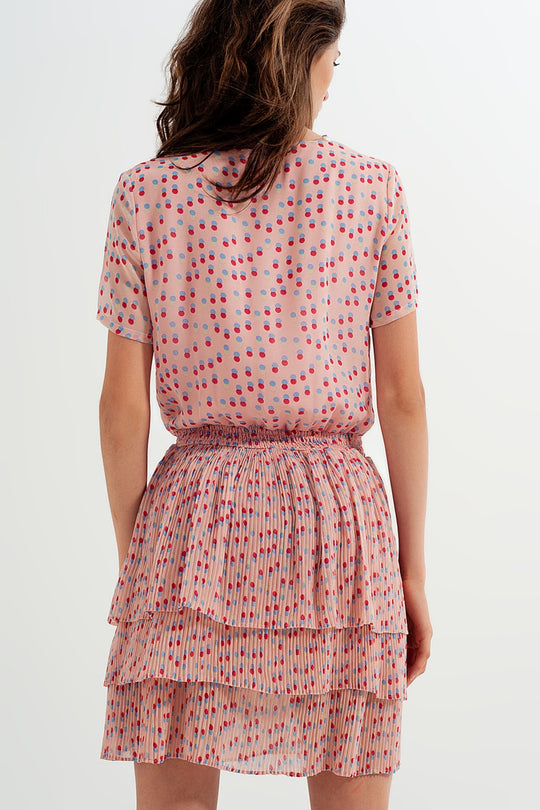 Shirred mini dress with peplum in pink
