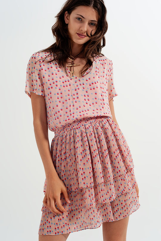 Shirred mini dress with peplum in pink