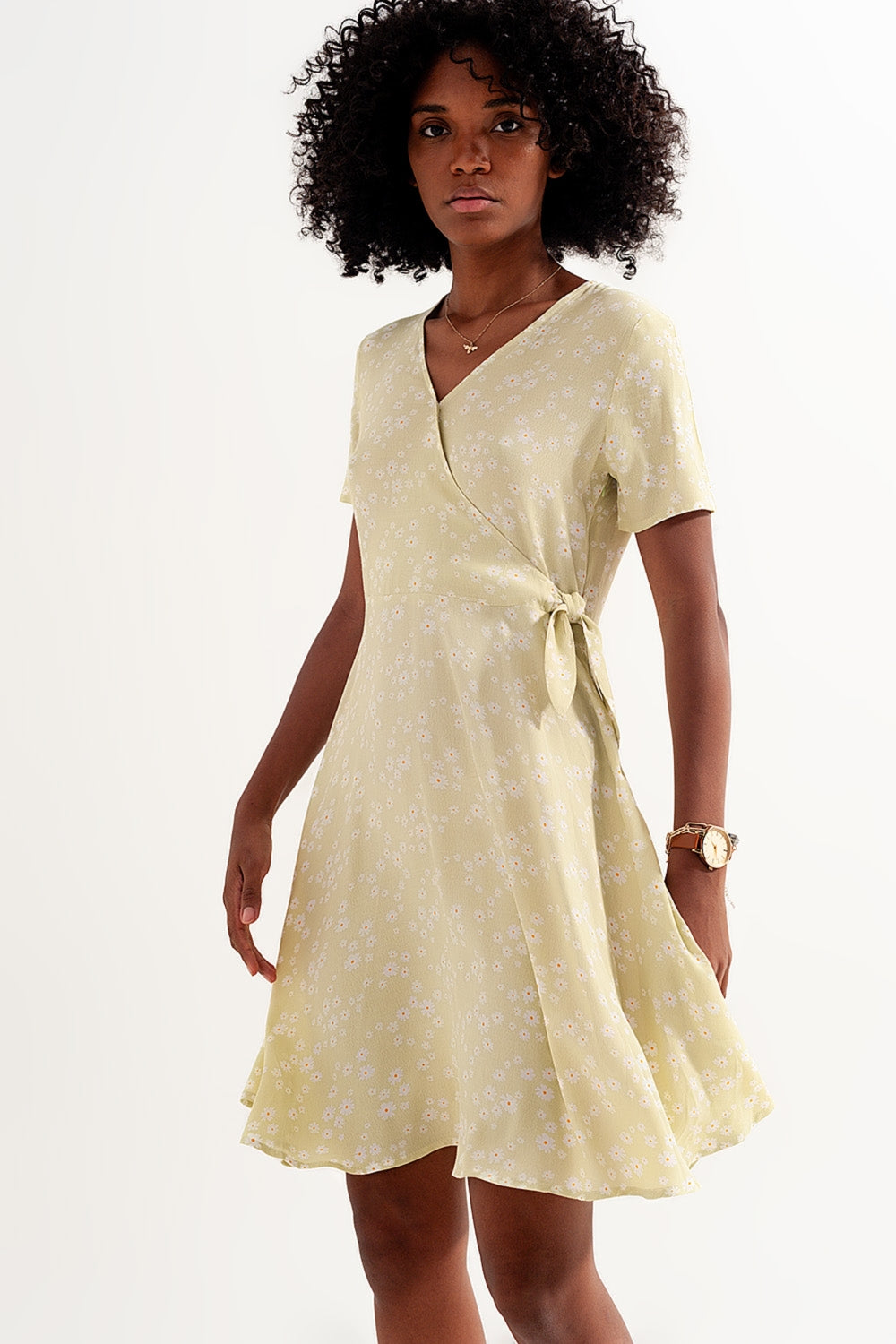Mini wrap dress in daisy print in green