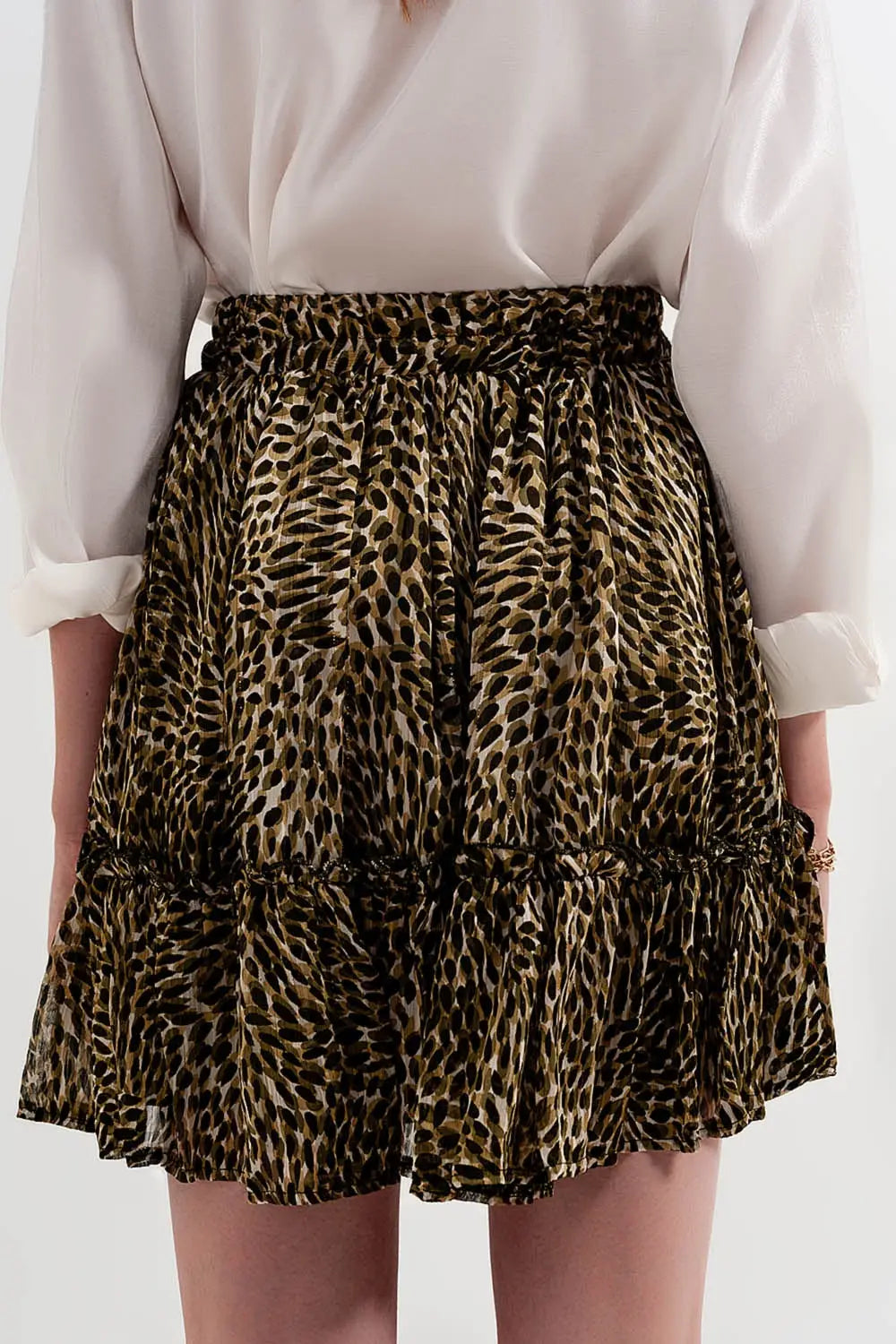 Green chiffon mini skirt with elastic waistband and shiny fabric - Skirts