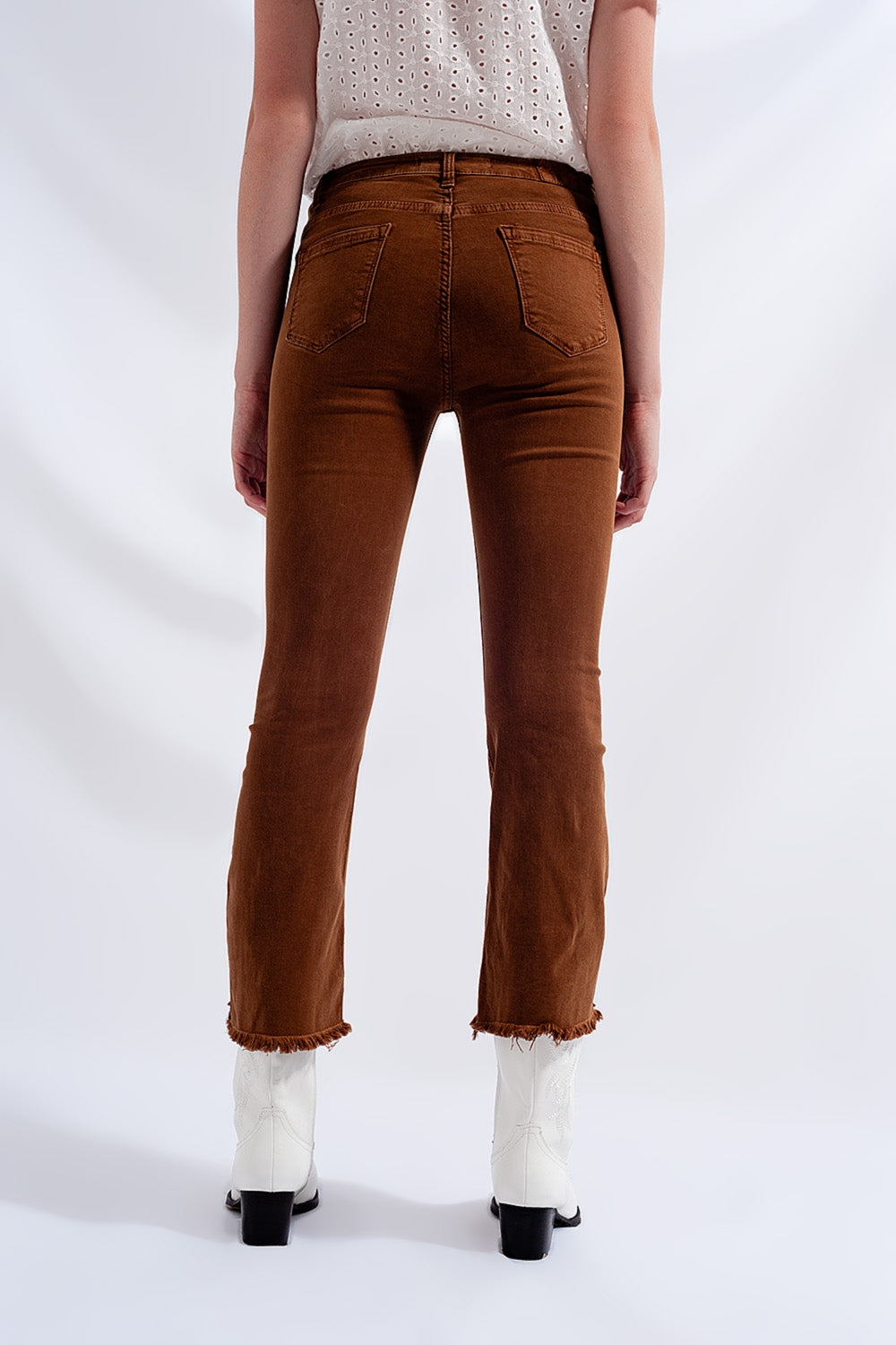High rise raw hem flared jeans in brown