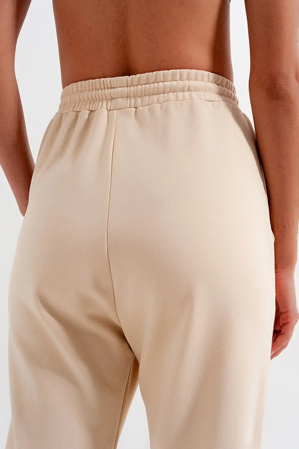 Joggers with elastic waist band in beige - Pants