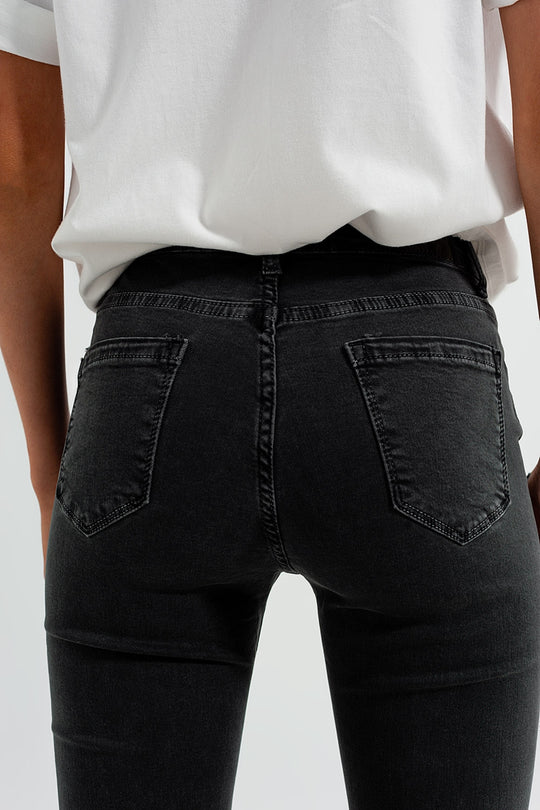Flare jeans in dark grey with asymmetric detail