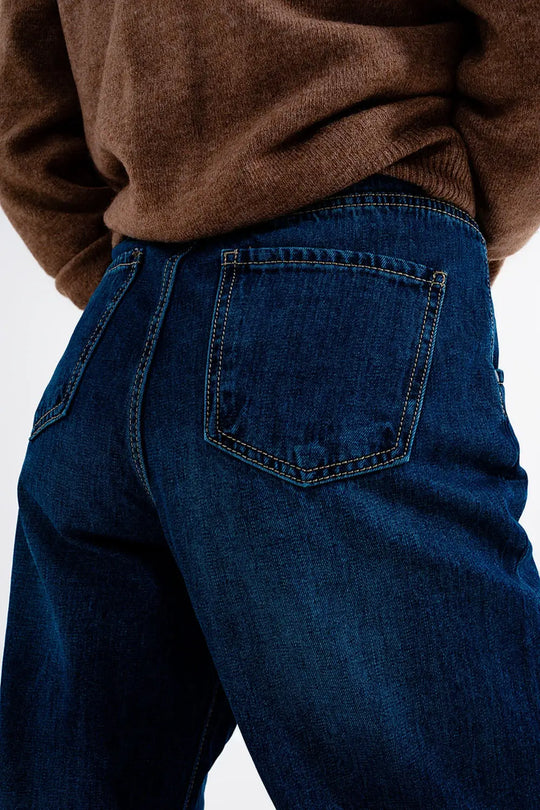 Medium blue pleat front pegged Jeans