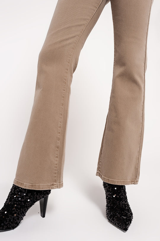 Flared jeans in beige