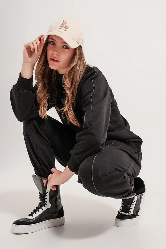 Joggers with drawstring waist and front seam in black - Pants