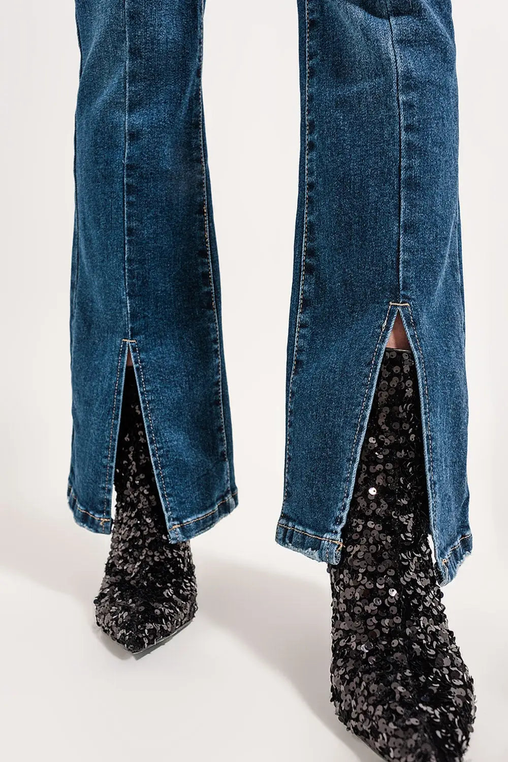 Flare jeans with split hem