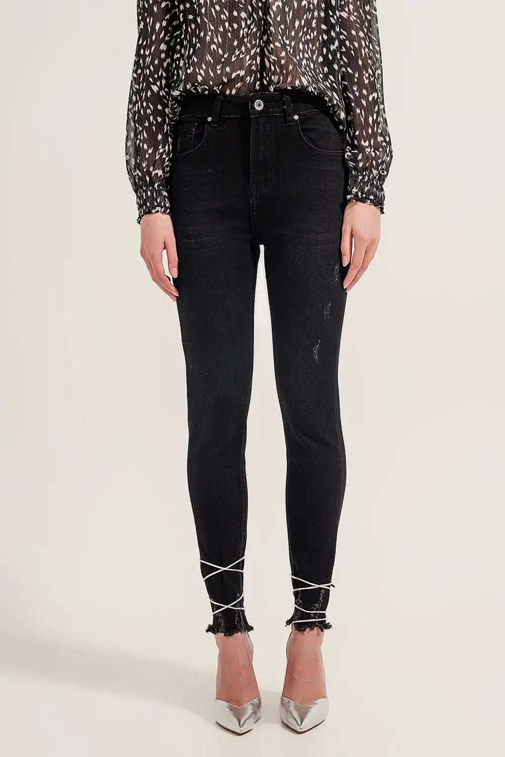 Raw hem skinny jeans in washed black