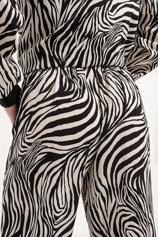 Wide leg trousers in zebra print - Pants