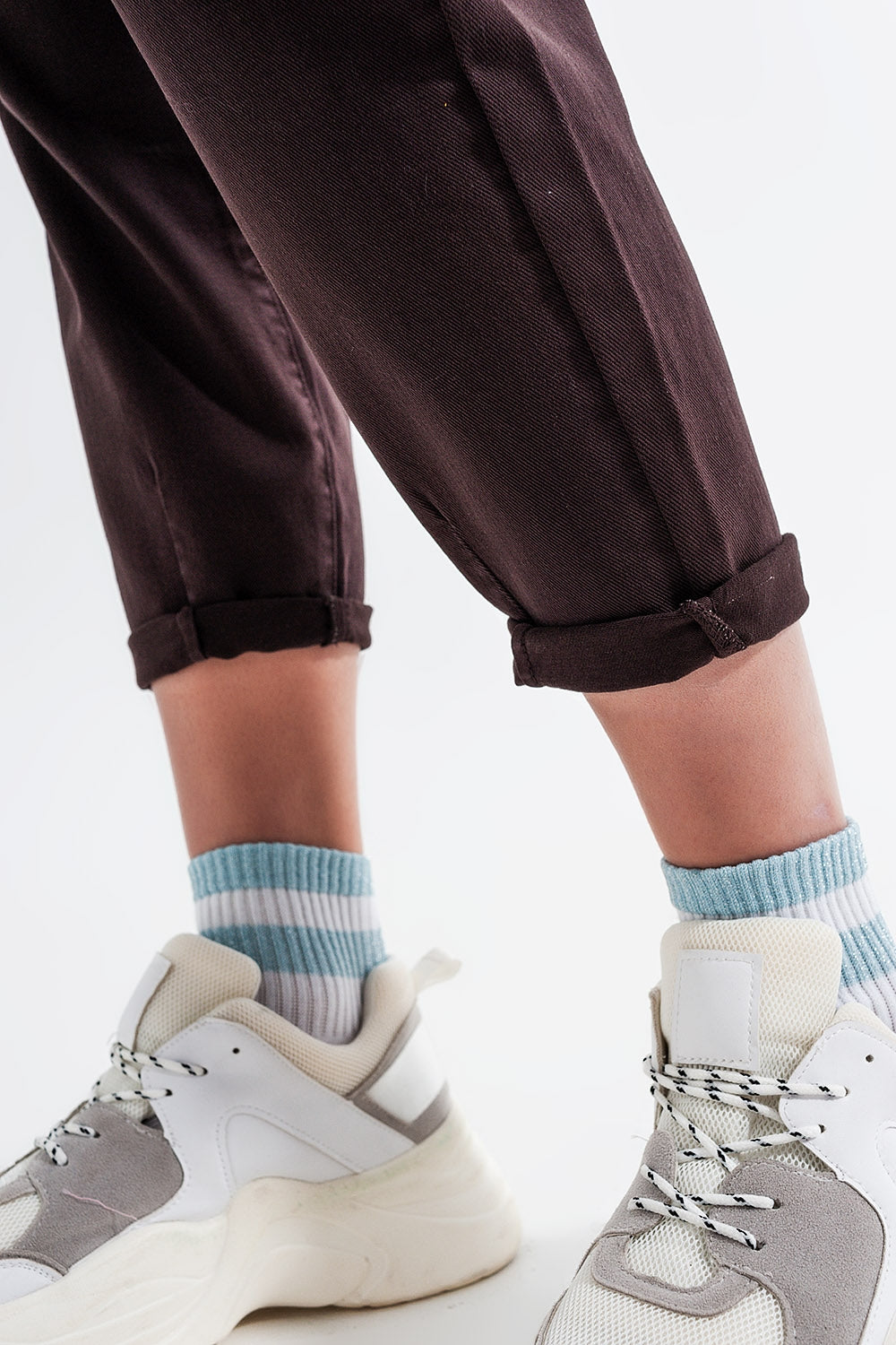 High rise jeans with pleat front in brown