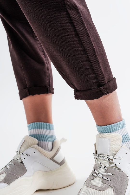 High rise jeans with pleat front in brown