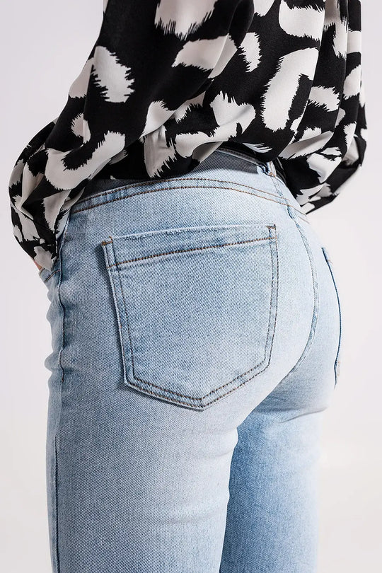 High waist jeans with slit hem in vintage wash