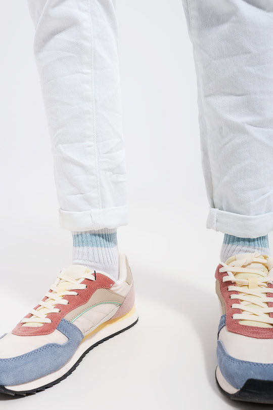 Exposed buttons skinny jeans in white