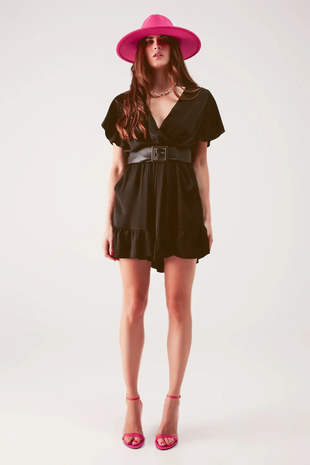 Wrap front frill hem jumpsuit in black - Jumpsuits
