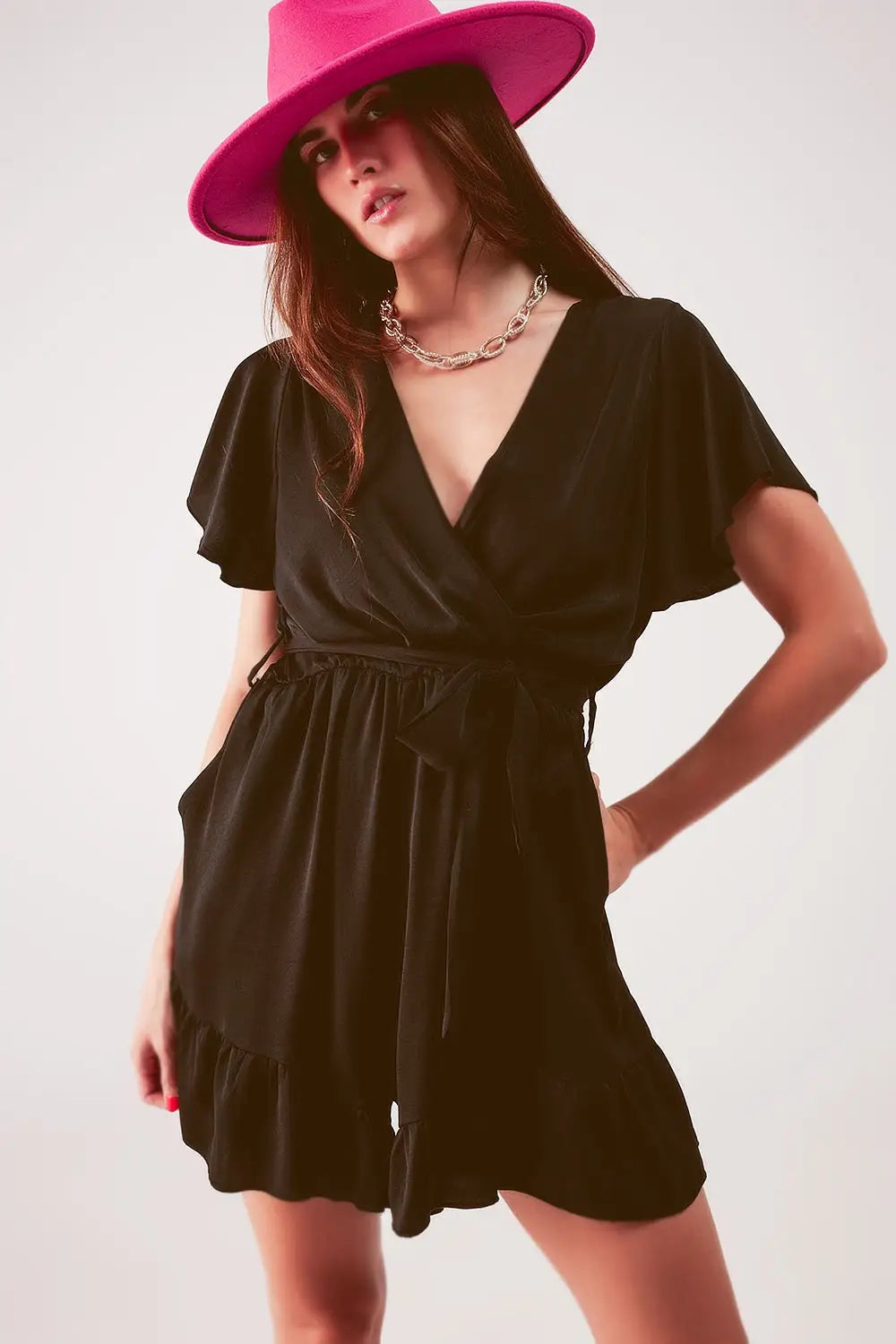 Wrap front frill hem jumpsuit in black - Jumpsuits