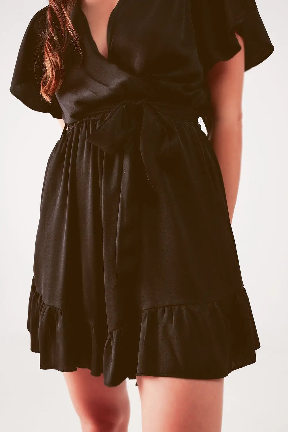 Wrap front frill hem jumpsuit in black - Jumpsuits