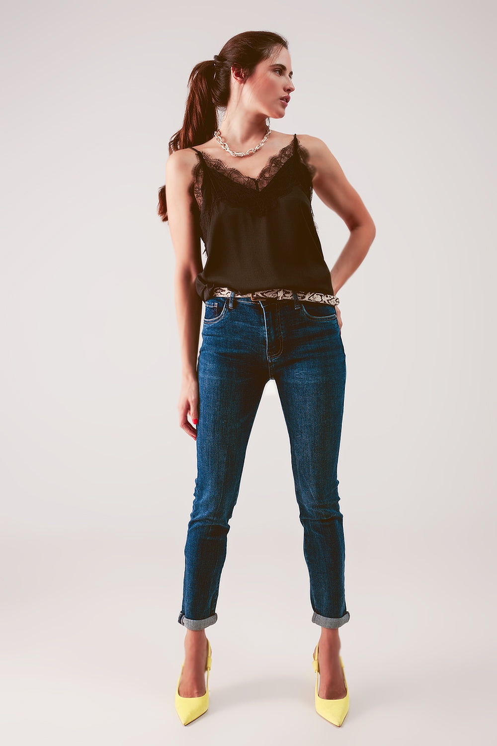 High rise skinny jeans in midwash blue