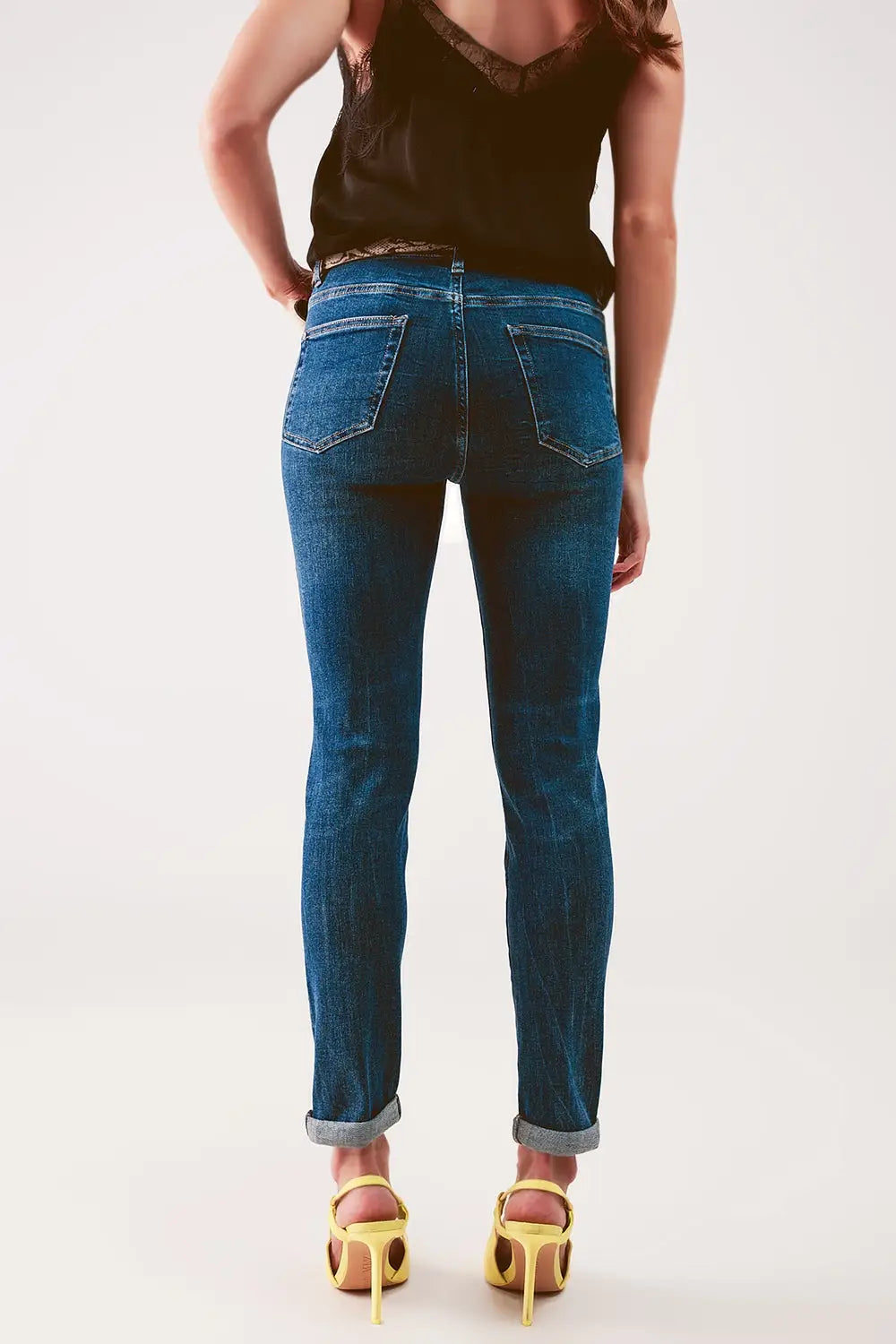 High rise skinny jeans in midwash blue