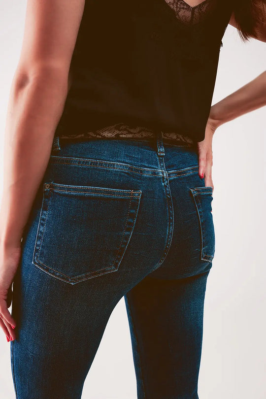 High rise skinny jeans in midwash blue