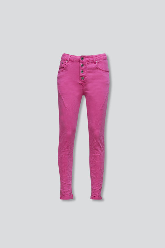 Exposed buttons skinny jeans in fuchsia