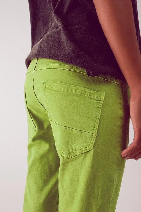 Exposed buttons skinny jeans in green - Colored Jeans