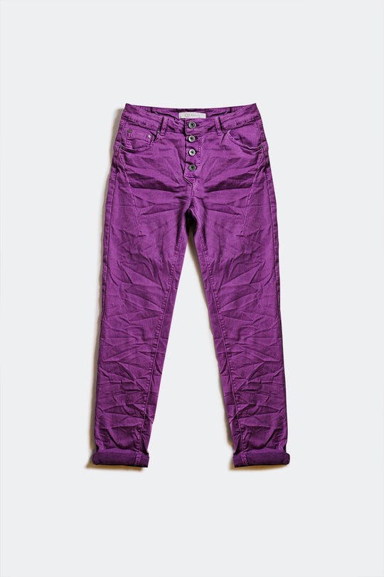 Exposed buttons skinny jeans in purple