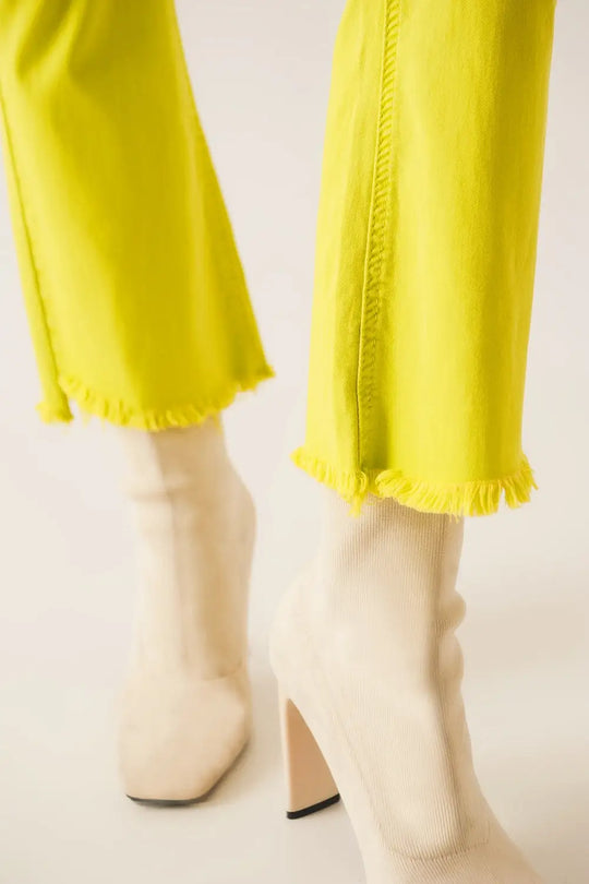 Flare jeans with raw hem edge in yellow - Colored Jeans
