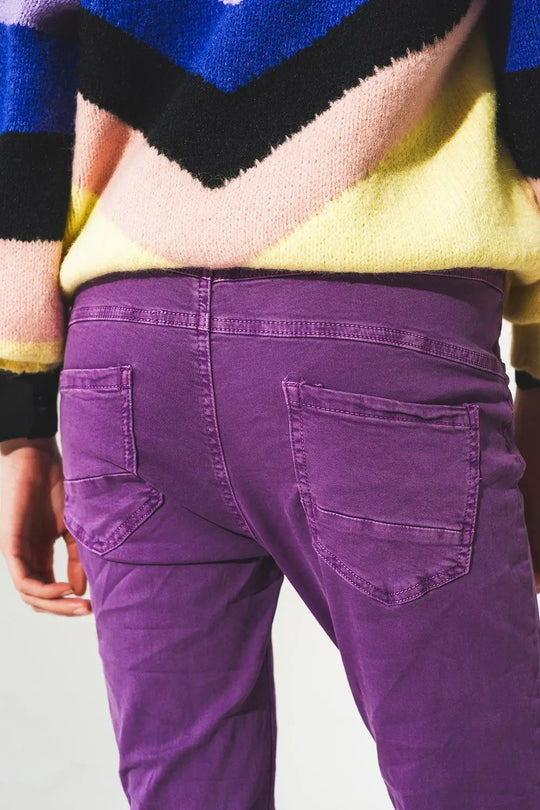 Exposed buttons skinny jeans in purple - Colored Jeans