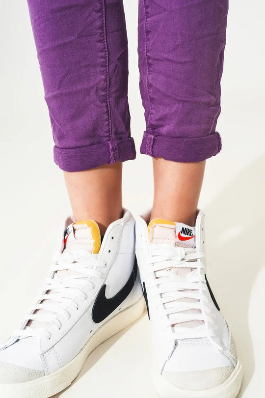 Exposed buttons skinny jeans in purple - Colored Jeans