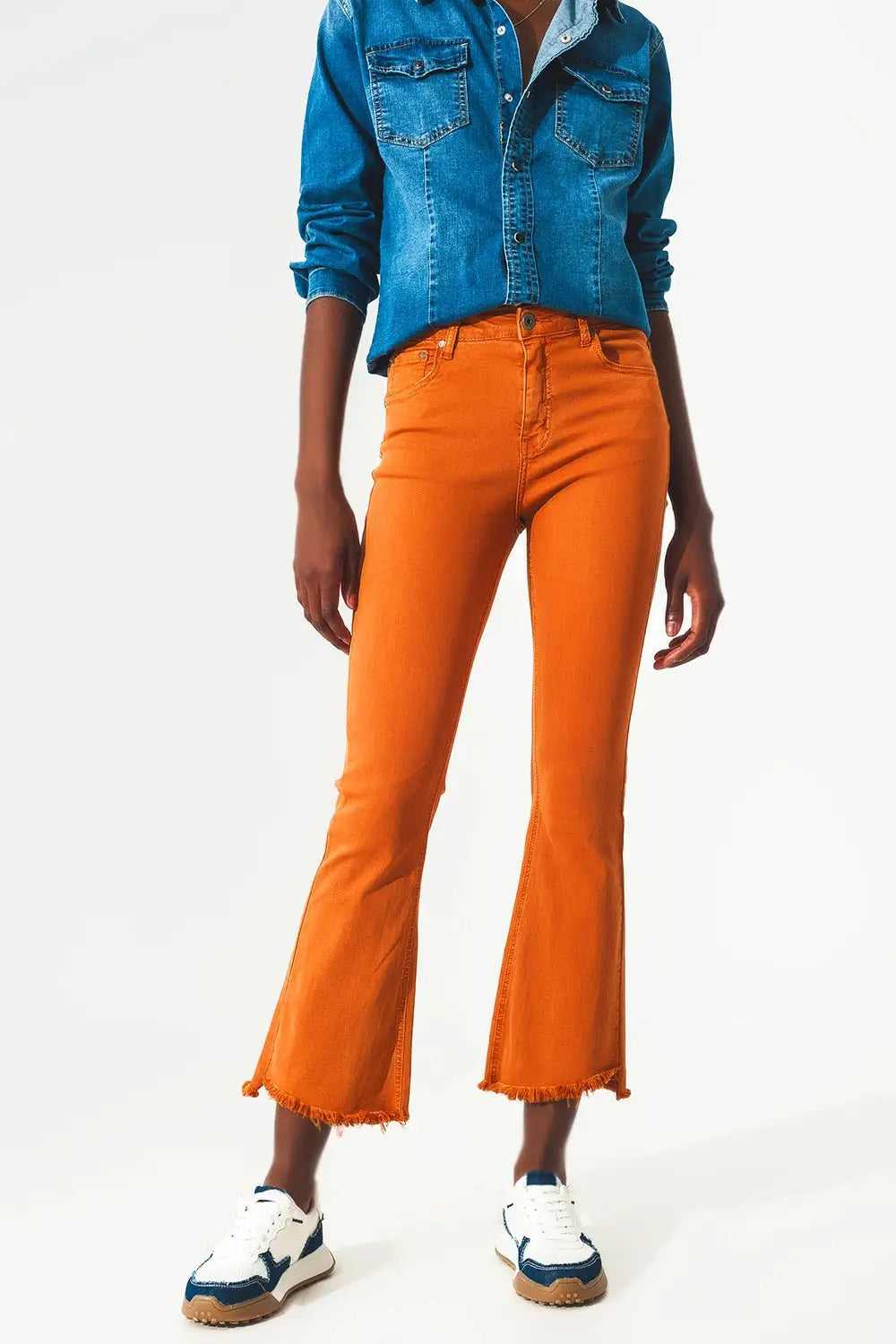 Flare jeans with raw hem edge in orange - Colored Jeans