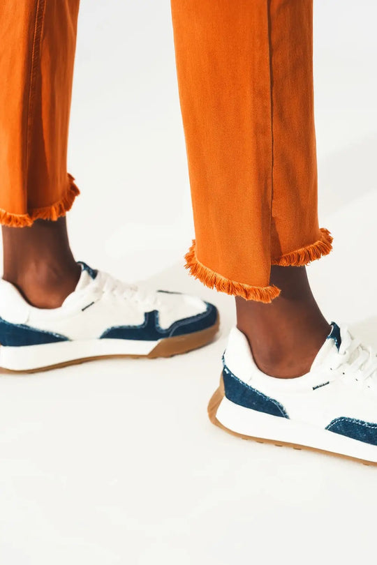 Flare jeans with raw hem edge in orange - Colored Jeans