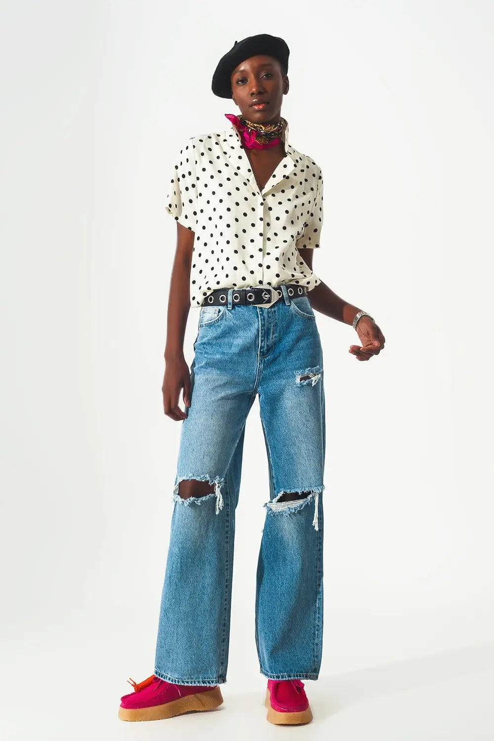 Straight jean in medium wash with rip and split hem