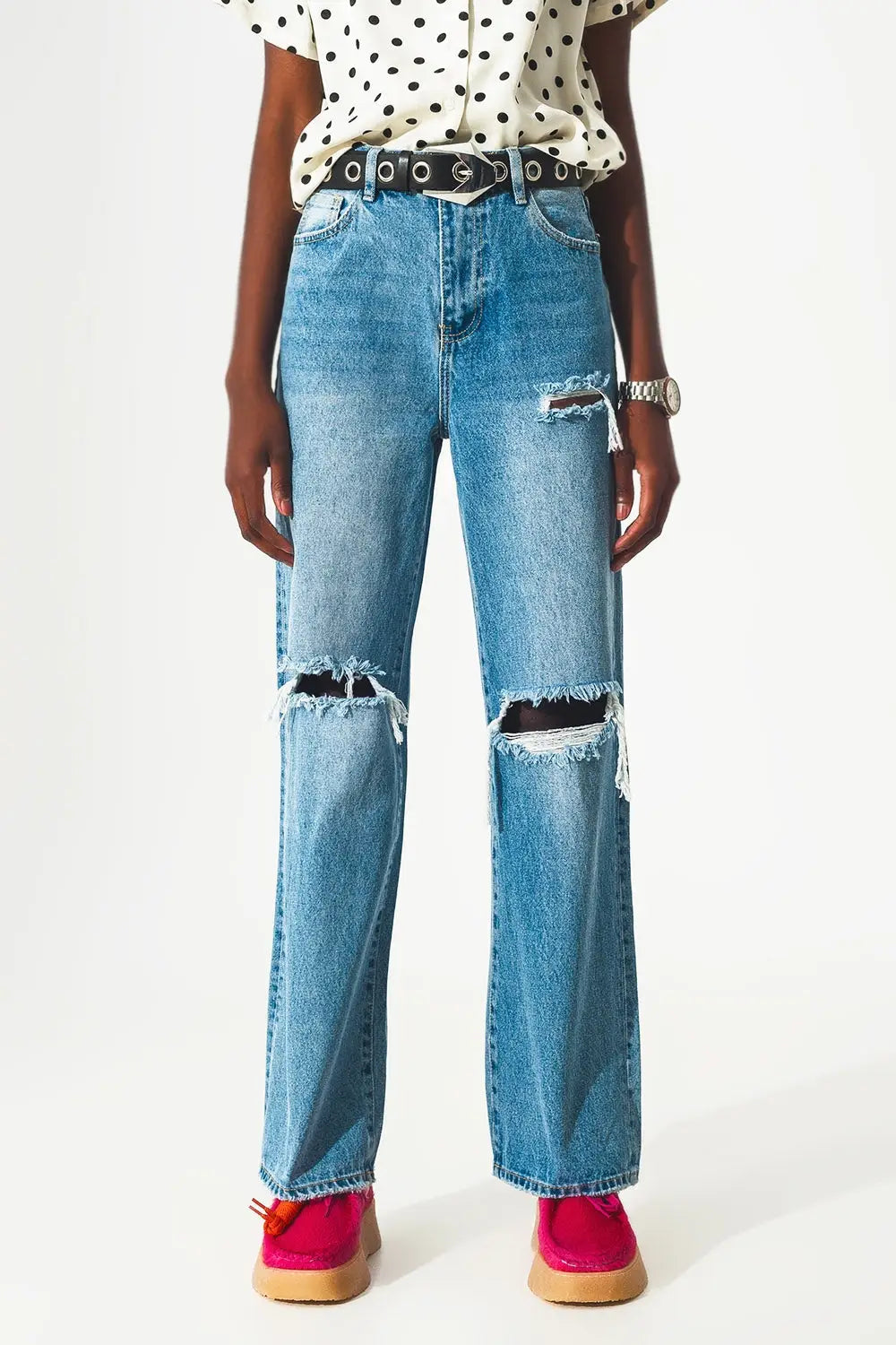 Straight jean in medium wash with rip and split hem