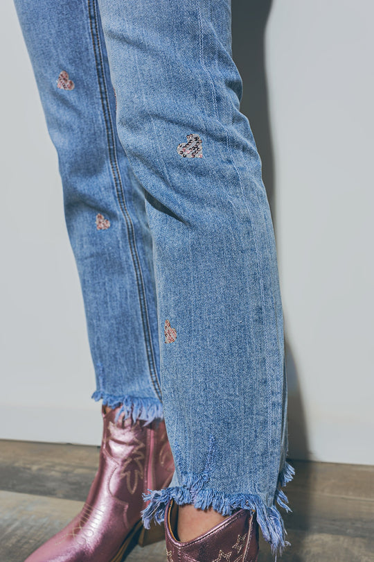 Heart Embellished Jeans with teared hem in Med Wash