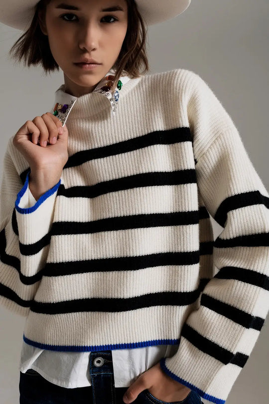black striped jumper with blue stripe detail on the bottom - Sweaters