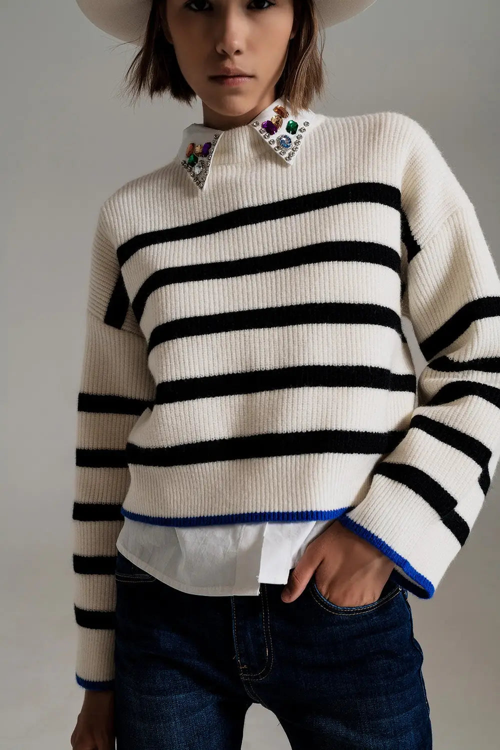 black striped jumper with blue stripe detail on the bottom - Sweaters