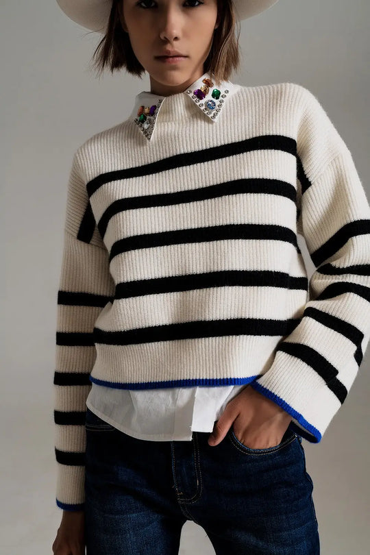 black striped jumper with blue stripe detail on the bottom - Sweaters