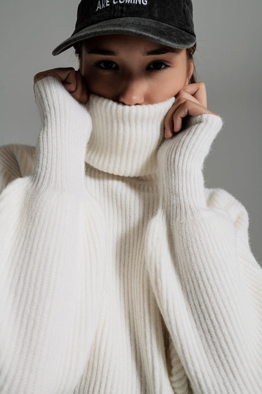 Cream ribbed knit turtleneck jumper with balloon sleeves