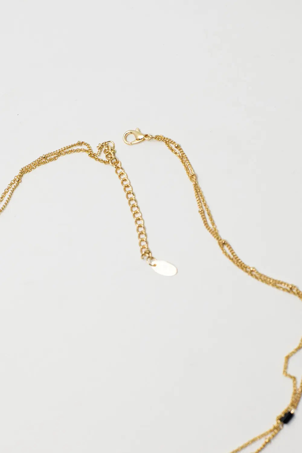 Short 2 in 1 Gold Necklace with Black Beads and White Marbled Stone. - GOLD