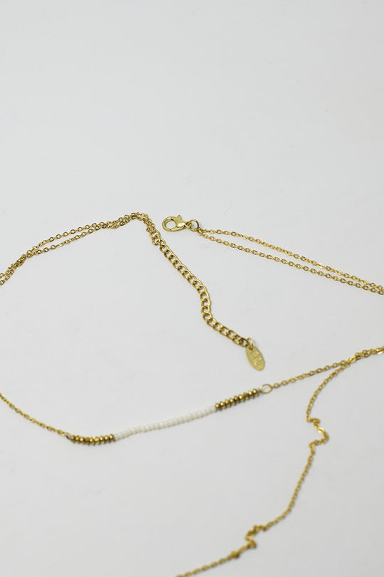 Long 2 in 1 gold necklace with bead details