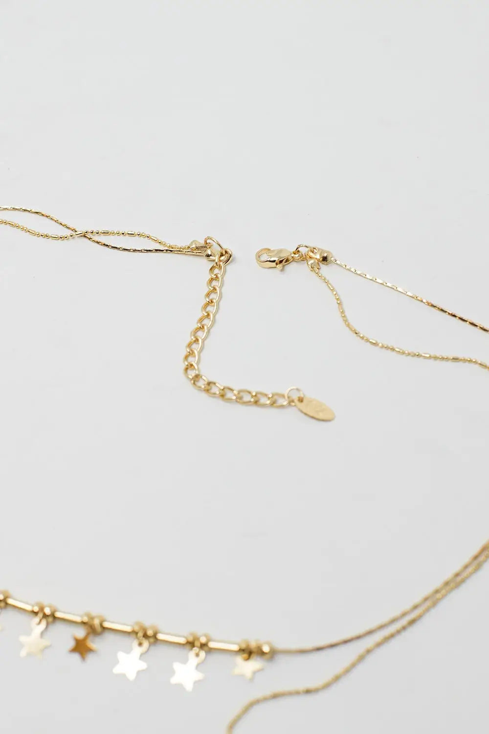 2 in 1 Necklace with Star and Heart Charms - GOLD