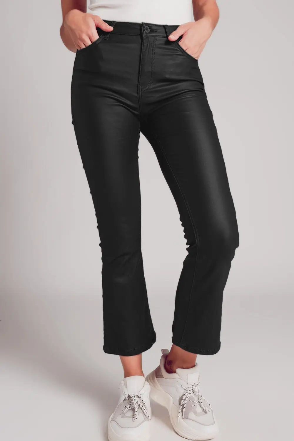 Stretch faux leather flare pants in black - Pants