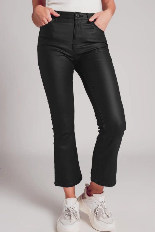 Stretch faux leather flare pants in black - Pants