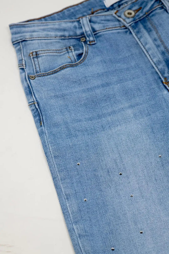Five-pocket skinny jeans in stretch denim with strass detail all over